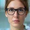 Portret van Anja de Vries, Kwaliteitsmanager bij FreshDairy Solutions.